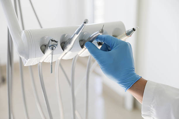 Professional Tooth Extraction technician working in Elburn, IL